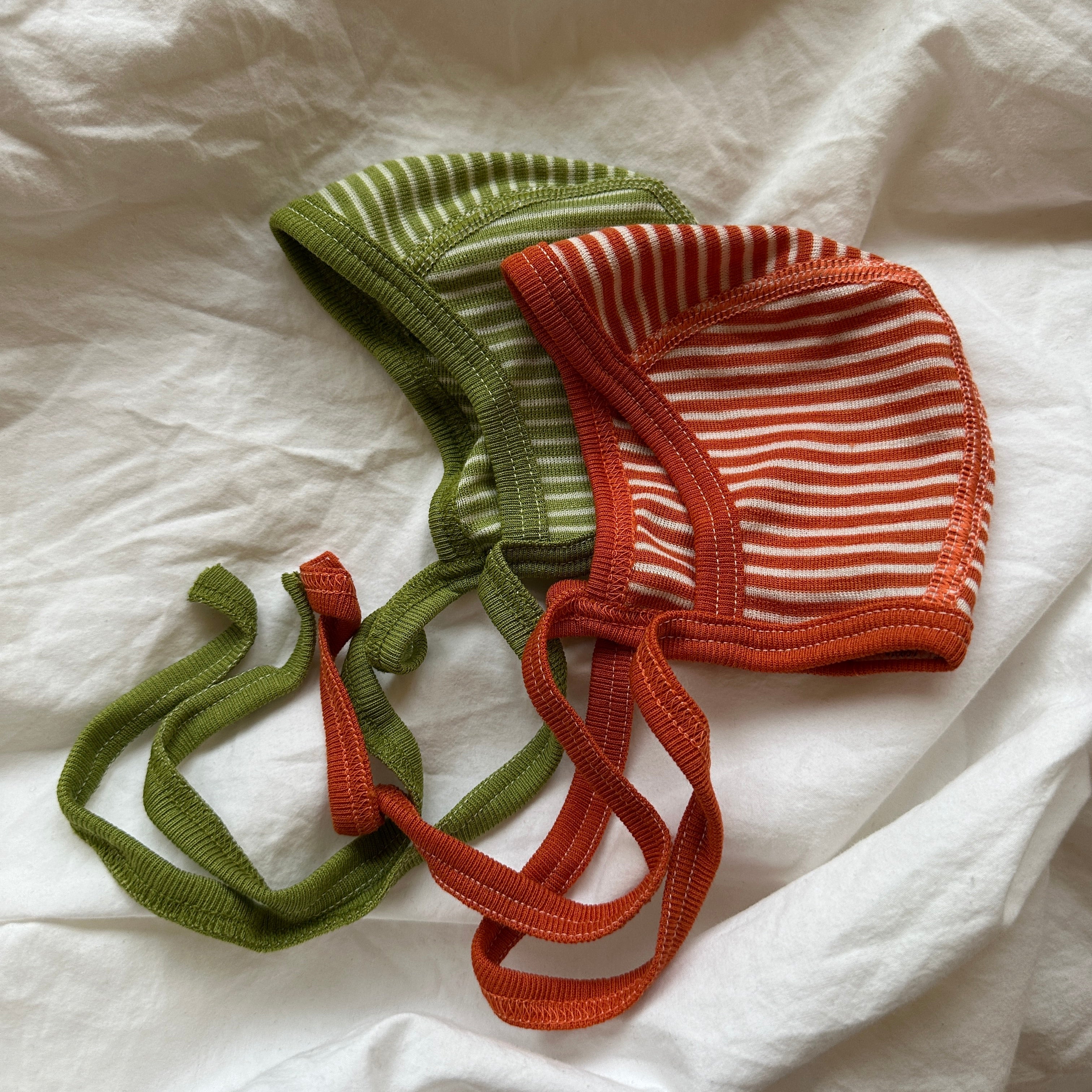 Cosilana Hätta, Orange/Randig